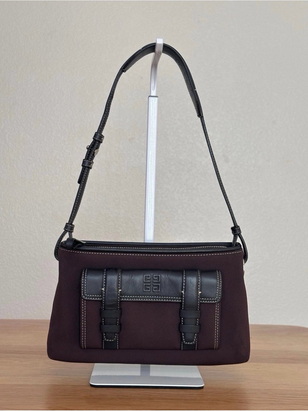 Vintage Givenchy shoulder bag crafted in deep burgundy canvas with black leather